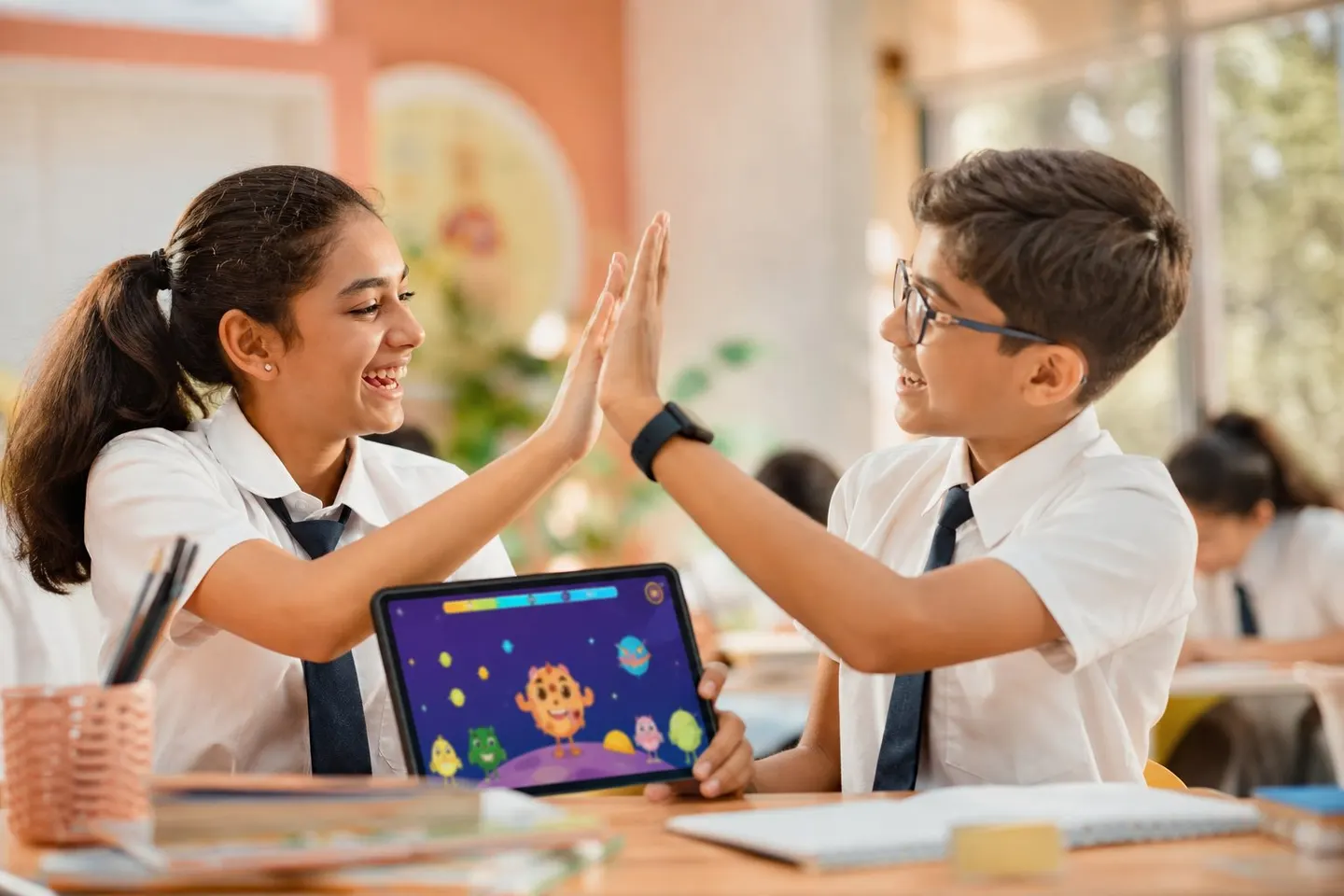 Students celebrating XP rewards on a tablet